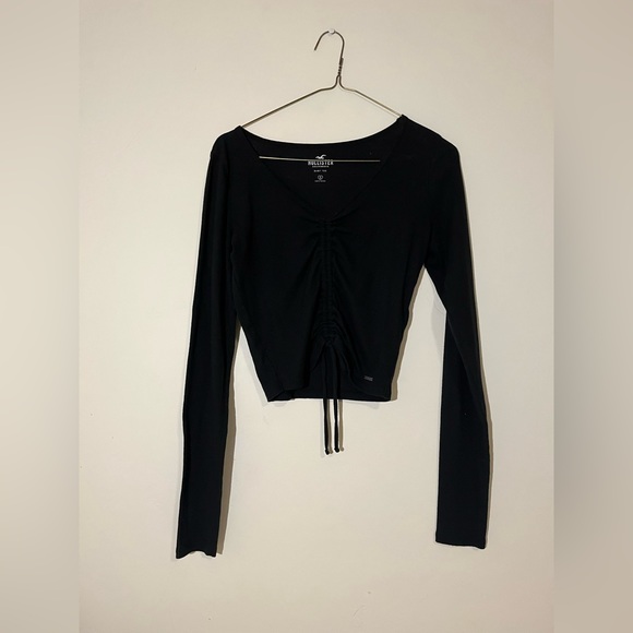 Hollister Tops - Hollister long sleeve. Rushing detail in front. Size small.